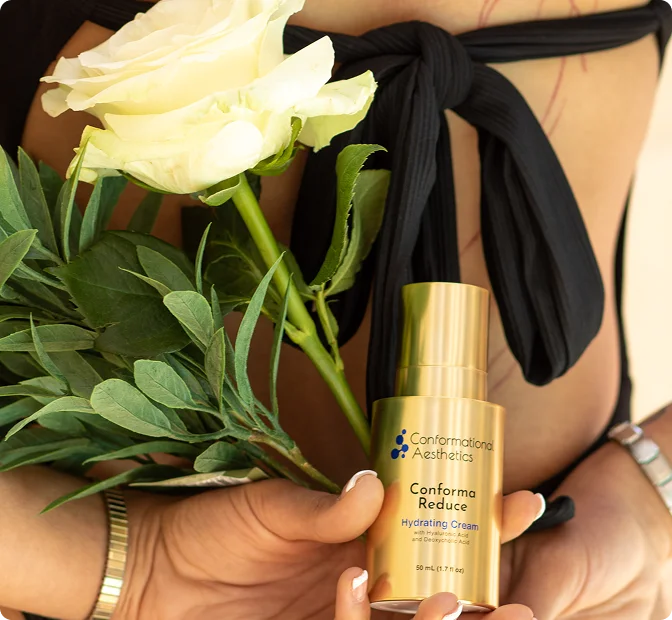 Conforma Reduce Hydrating Cream held beside white roses on the clinical study methods section.