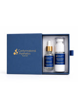 Conformational Aesthetics Travel Set in a navy blue gift box featuring Conforma HA 1% hyaluronic acid serum and Conforma Reduce 1% deoxycholic acid with 1% hyaluronic acid.