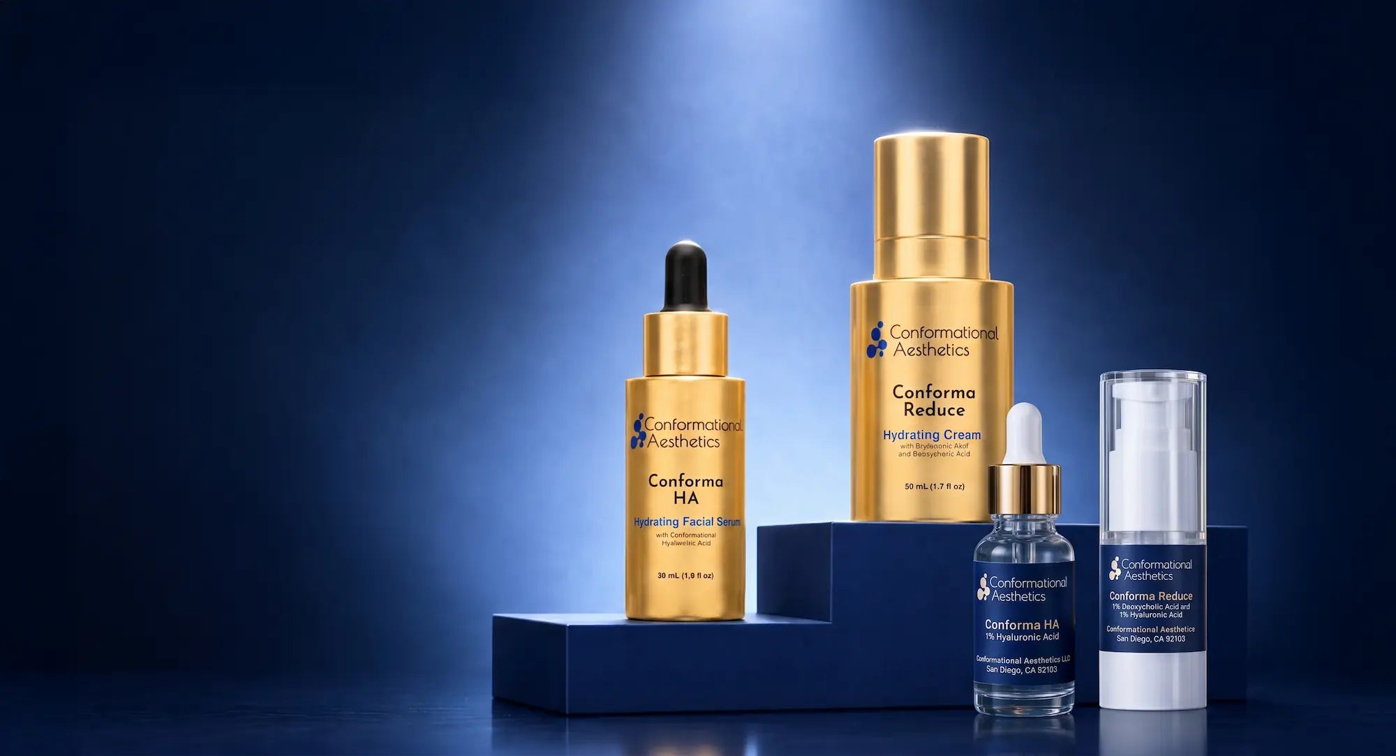 Four skincare products from Conformous Aesthetics arranged on dark blue pedestals against a deep blue gradient background. The set includes a gold-toned facial serum bottle with a black dropper, a larger gold-toned serum bottle with a gold cap, a small clear bottle with a white dropper, and a white bottle with a clear cap.