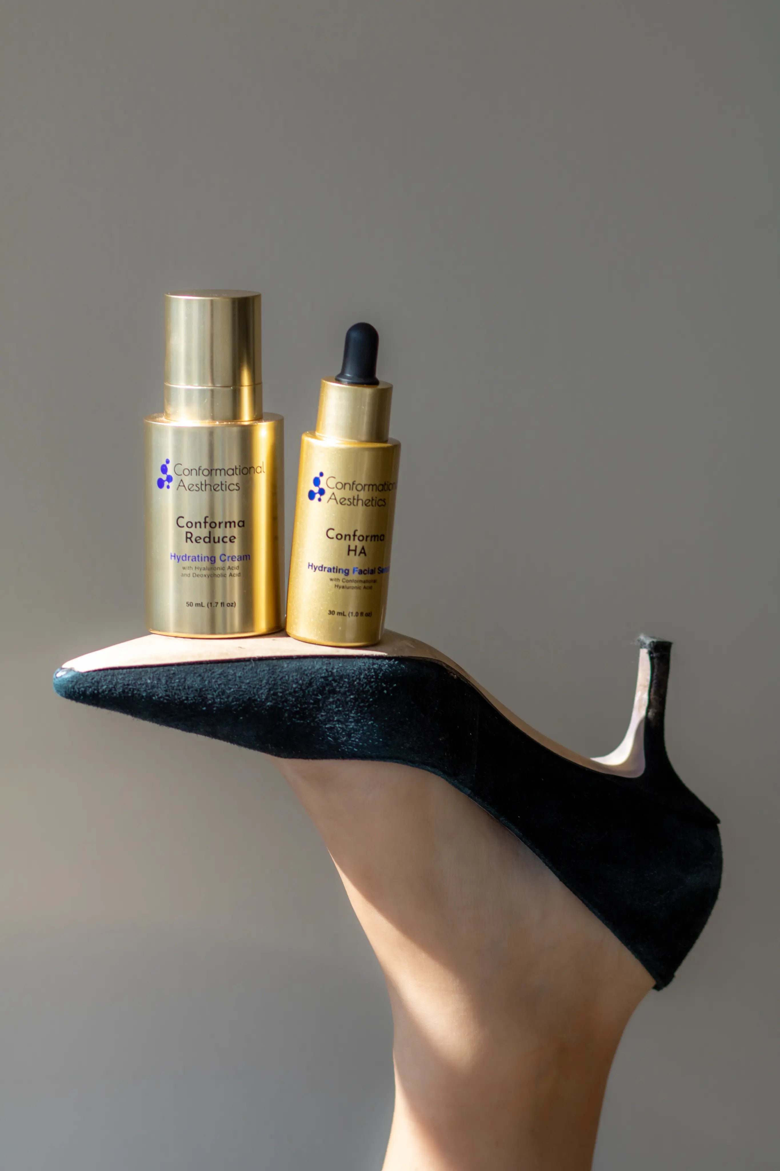 Conformational Aesthetics products displayed on a black heel
